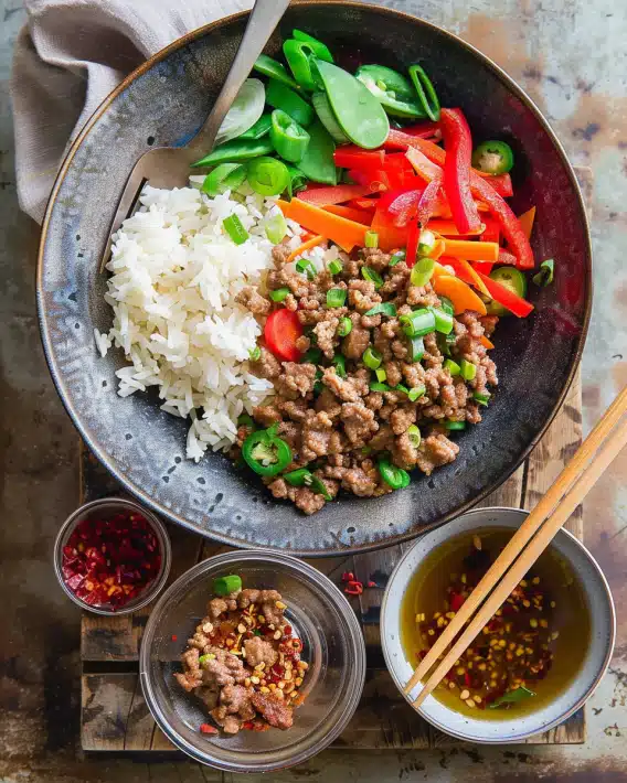 Spicy Ground Beef Stir-Fry Bowl with Garlic Veggies & Steamy Rice