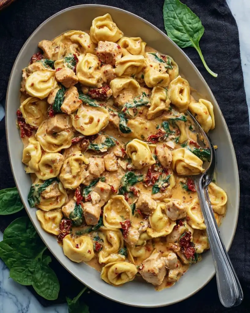 Tuscan Chicken Tortellini with Sun-Dried Tomatoes and Creamy Parmesan Sauce Recipe