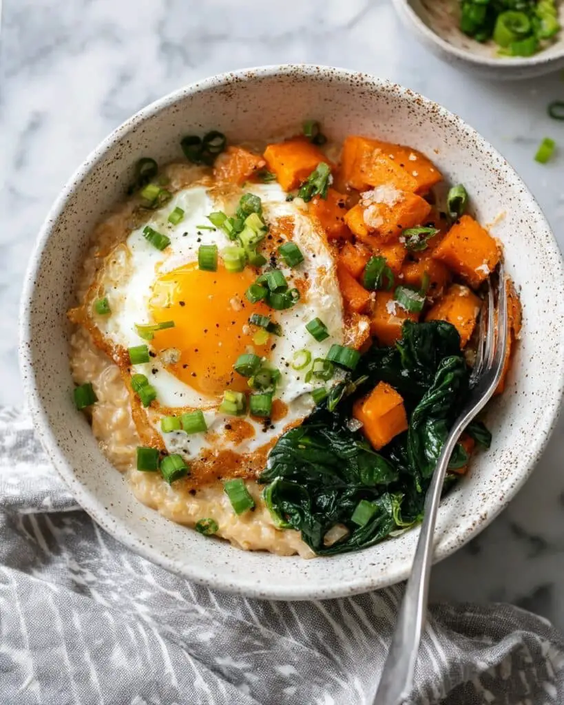 Cheesy Savory Oatmeal with Sweet Potatoes and Fried Eggs Recipe