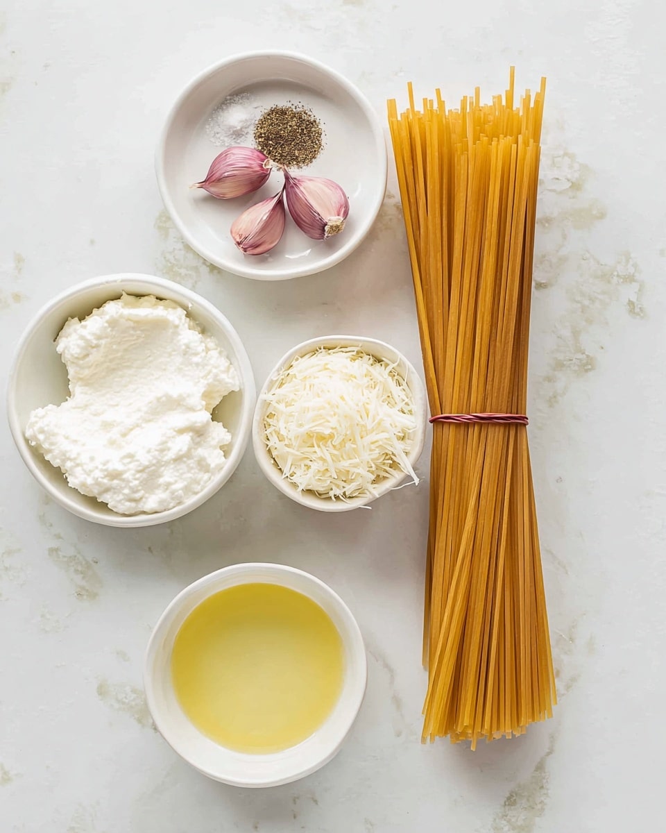 The image shows five cooking ingredients arranged on a white marbled surface. On the right side, there is a bundle of uncooked golden-brown spaghetti tied with a thin reddish-brown string. To the left of the spaghetti, there are four white bowls: the top bowl contains two purple-tinged garlic cloves, coarse salt, and ground black pepper; below it is a bowl of creamy white ricotta cheese with smooth texture; next to it is a bowl of pale yellow olive oil with a shiny surface; and above the oil is a bowl with shredded white cheese, likely parmesan, with a fine texture. The setup is clean and neatly arranged, with soft natural light highlighting the colors and textures of the ingredients photo taken with an iphone --ar 4:5 --v 7