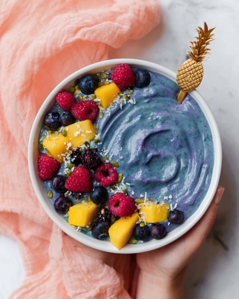 Blue Smoothie Bowl with Blue Spirulina and Tropical Fruit Toppings Recipe