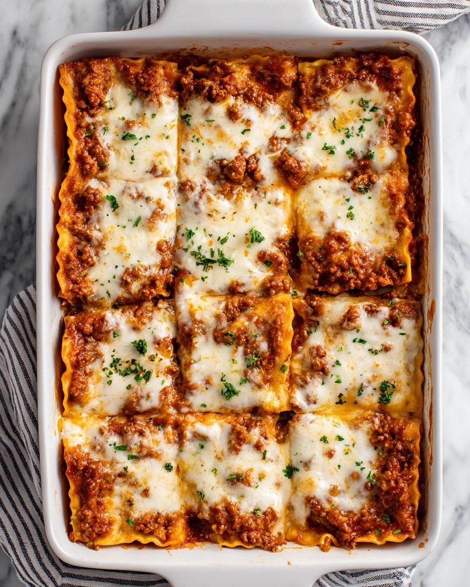 A white baking dish filled with a freshly baked lasagna cut into nine square pieces. The top layer is melted white cheese with browned spots and small bits of parsley scattered around. Underneath the cheese, layers of light yellow pasta sheets, rich red tomato sauce with ground meat, and creamy white sauce are visible along the edges. The lasagna edges have a golden-brown baked color, and the whole dish rests on a white marbled surface with part of a striped cloth visible below one corner. Photo taken with an iphone --ar 4:5 --v 7