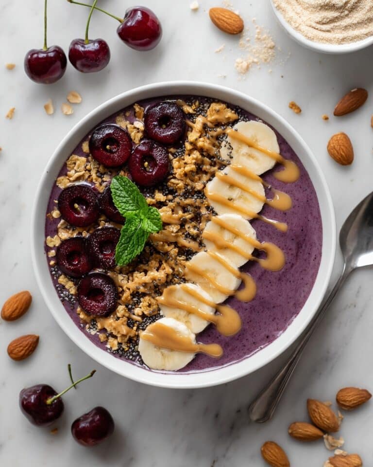 Cherry Smoothie Bowl with Banana, Almond Butter, and Granola Recipe