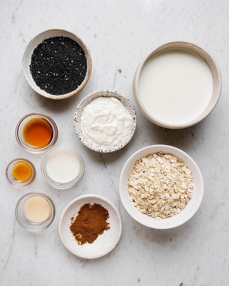 A top-down view of eight small containers arranged on a white marbled surface, each holding a different ingredient: a large white bowl filled with smooth white liquid on the right, a white bowl with beige rolled oats below it, a speckled white bowl with thick white yogurt above the oats, a small white bowl with brown cinnamon powder at the bottom left, a round white and brown bowl filled with tiny black seeds to the left of the yogurt, and three small clear glass bowls with light beige, creamy white, and dark amber liquids placed in a scattered pattern around the black seeds. Photo taken with an iphone --ar 4:5 --v 7