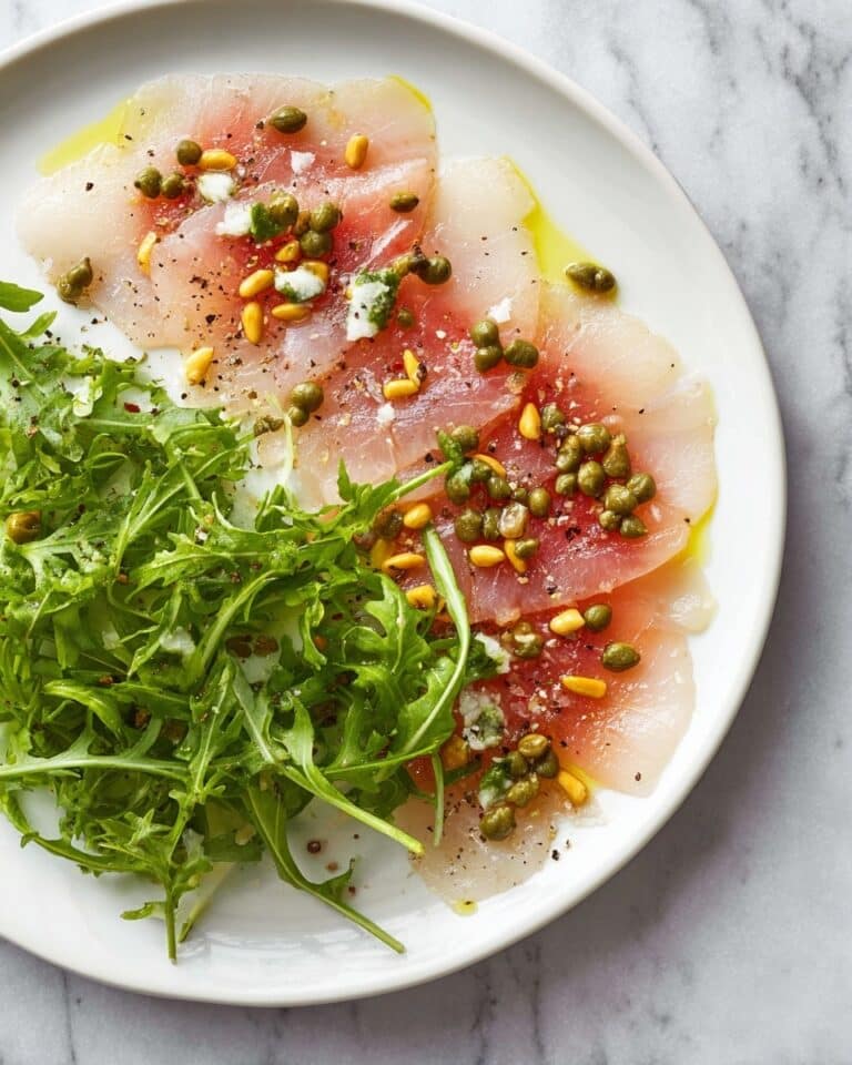 Classic Tuna Carpaccio with Arugula, Capers, and Pine Nuts Recipe