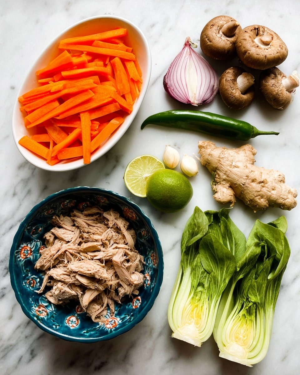 The image shows fresh ingredients on a white marbled surface. There is one white oval bowl filled with many thin strips of bright orange carrots on the top layer, with a small reddish onion and two white garlic cloves beside them. Below the bowl is a deep blue bowl decorated with floral patterns that holds shredded cooked light brown meat. To the right of the oval bowl is a green chili placed diagonally. Above the chili is a half lime with a bright green inside, and a group of six brown mushrooms, some showing their light cream bottoms. Below is a large piece of light brown ginger root with a textured surface. On the bottom right corner, three halves of light green bok choy are placed with their leaves facing down and the cut sides up, showing the white and green layers. Photo taken with an iphone --ar 4:5 --v 7