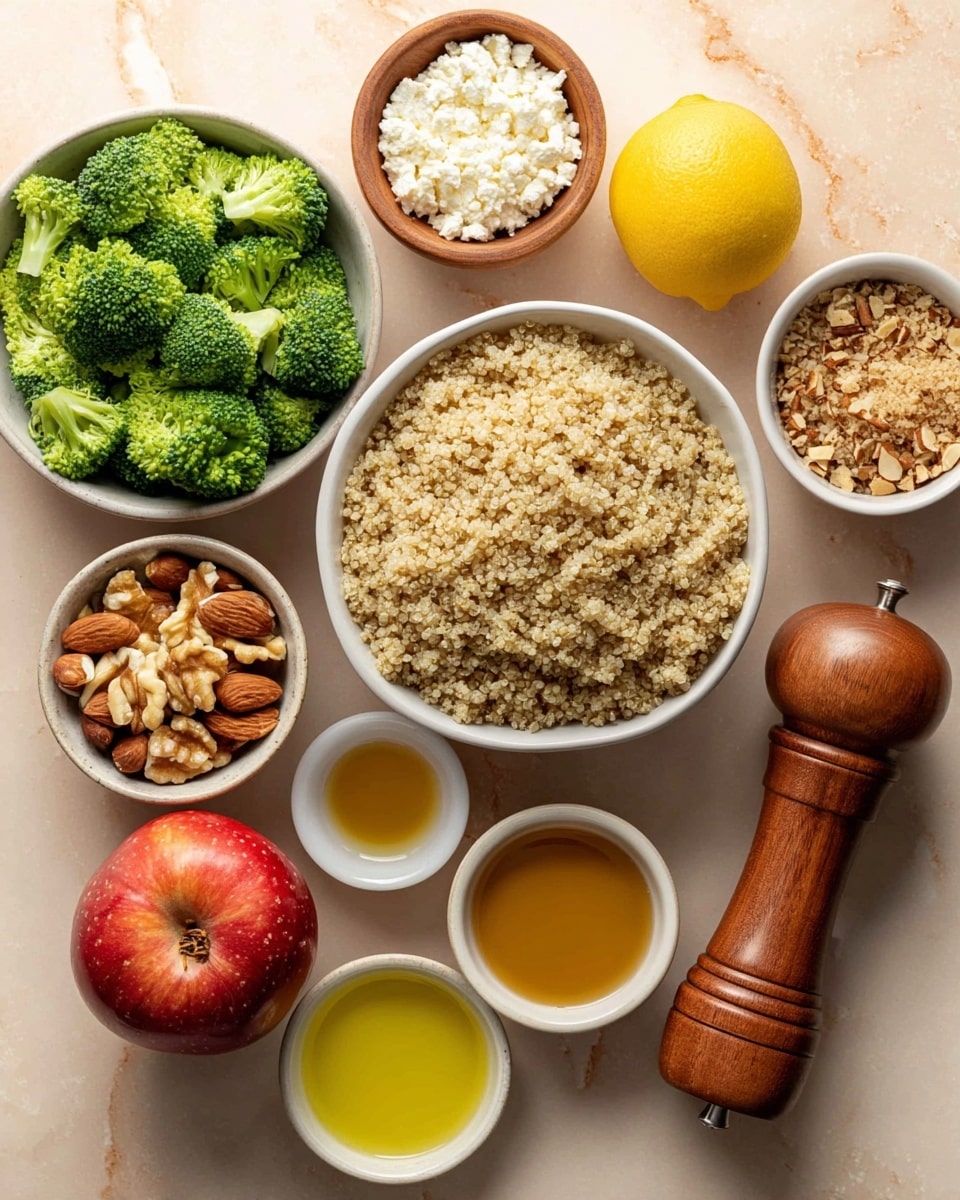 The image shows a flat lay of food ingredients arranged on a white marbled surface. In the center is a large white bowl filled with cooked quinoa, light beige in color with a fluffy texture. Surrounding it are smaller white bowls containing bright green broccoli florets, a mix of chopped walnuts and almonds with light and dark brown shades, and white cottage cheese with a grainy texture. There are also four small white bowls holding light yellow olive oil, golden honey, pale golden vinegar, and grainy mustard in light brown. A whole yellow lemon and a red apple are placed beside the bowls. A large wooden pepper grinder with a smooth finish lies next to the apple, adding a warm brown tone to the scene. The photo taken with an iphone --ar 4:5 --v 7