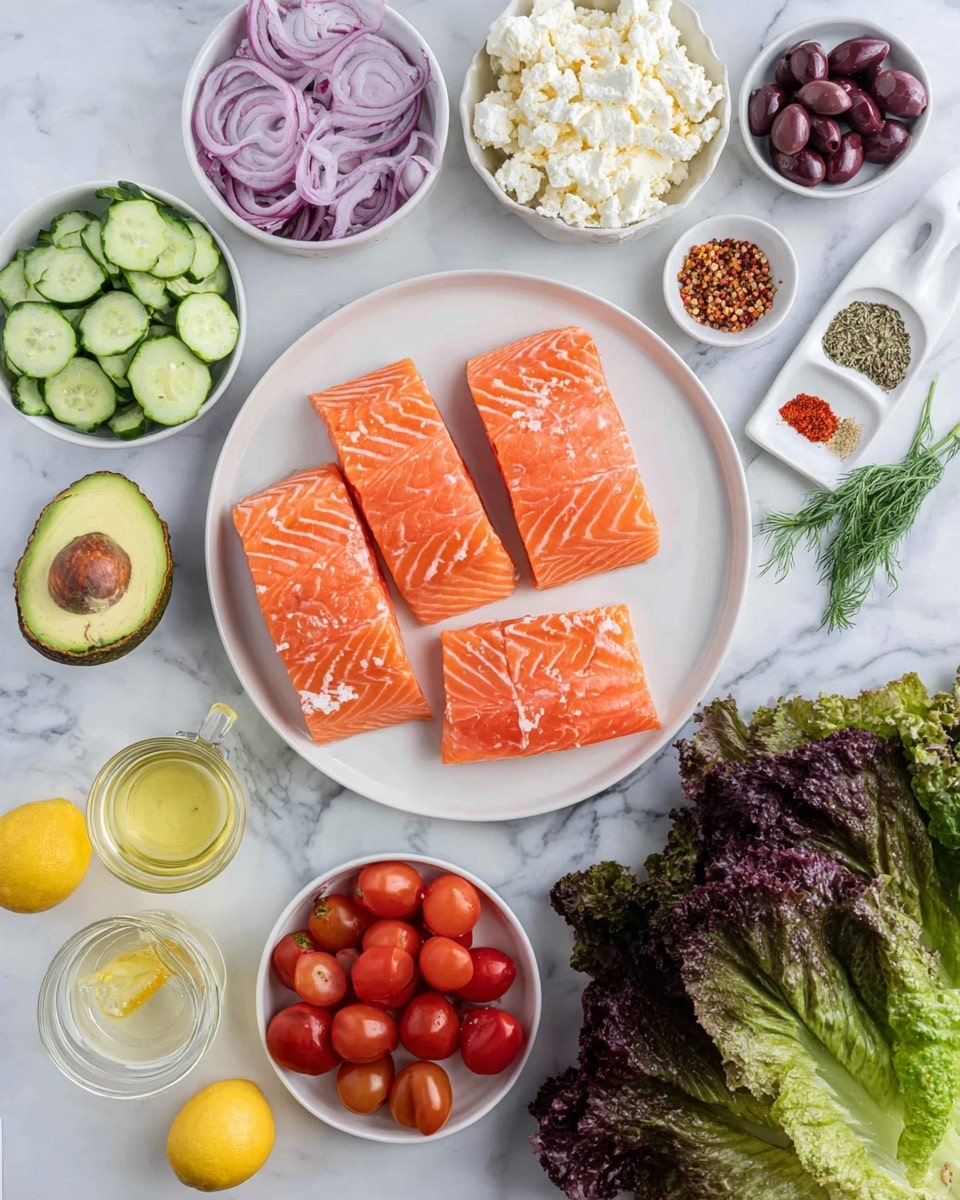 A flat lay shows four bright orange raw salmon pieces with visible white lines, placed on a round white plate in the center. Surrounding the plate are small white bowls filled with light green cucumber slices, crumbled white cheese, sliced purple onions, halved red cherry tomatoes, and dark purple olives. One half of an avocado with a brown seed and another half without seed are placed on the left side. Two yellow lemon halves sit at the bottom left. A small glass bowl with minced garlic, a tiny clear jug with pale yellow oil, a sprig of green herbs, and a white plate with four piles of spices—that are red flakes, salt, pepper, and a brown herb—are arranged near the top. Large dark red and green leafy lettuce fills the bottom right corner. Everything is set on a white marbled surface. Photo taken with an iphone --ar 4:5 --v 7