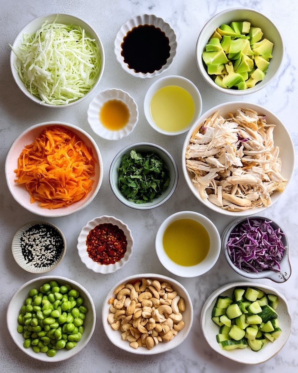 The image shows many small white bowls on a white marbled surface, each with different fresh ingredients for a meal. The largest bowls hold shredded white and purple cabbage, shredded orange carrots, shredded light chicken, chopped green cucumbers, and diced green avocados. Smaller bowls contain chopped green onions, chopped fresh mint, chopped cilantro, raw green edamame, cashew nuts, black and white sesame seeds, minced garlic and ginger, red chili flakes, dark soy sauce, clear light vinegar, golden honey or syrup, and yellow oil, all arranged neatly in rows. The colors vary from bright greens and orange to creamy white, purple, and light brown, creating a fresh, healthy look. Photo taken with an iphone --ar 4:5 --v 7